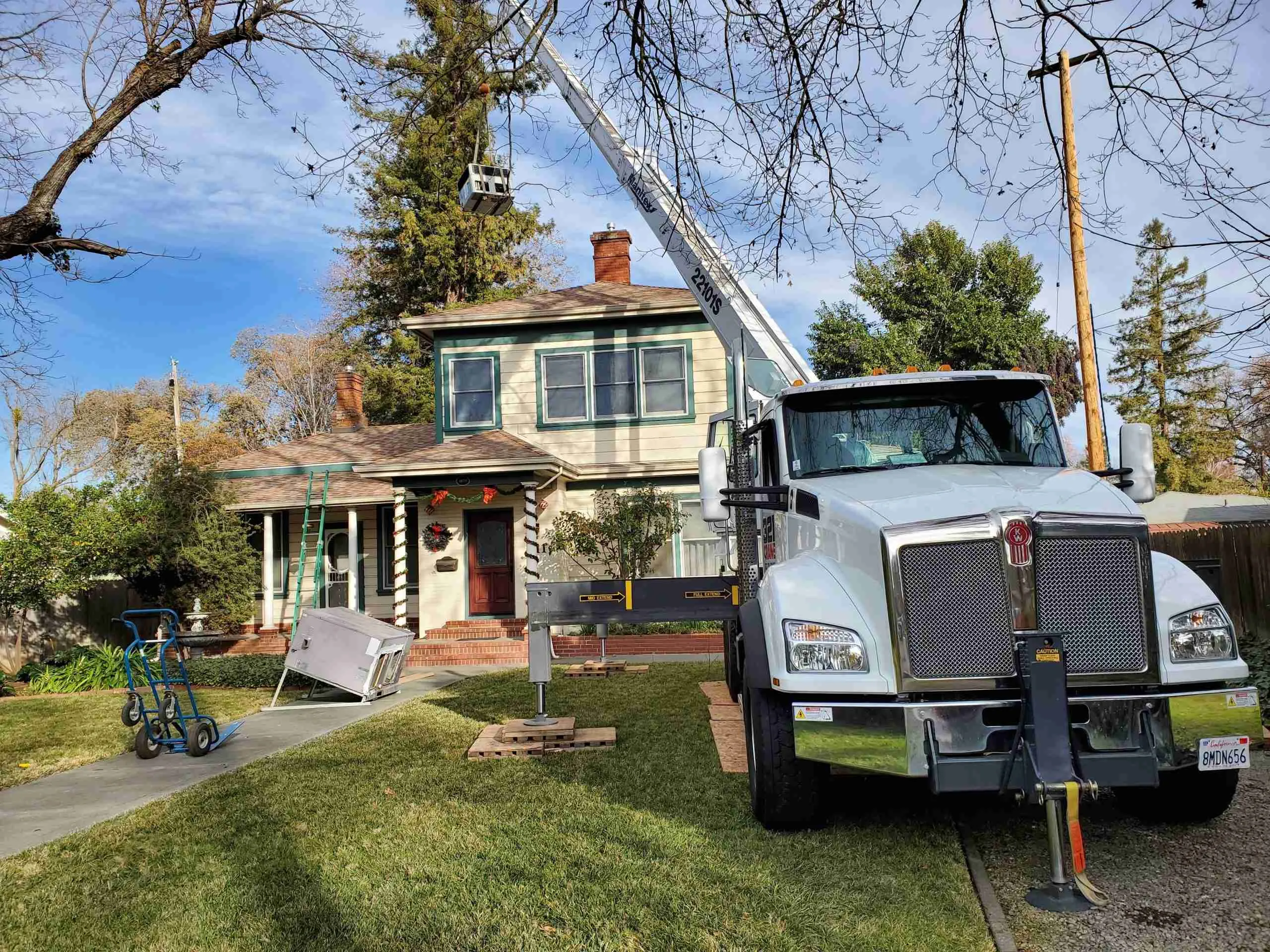 HVAC technician performing a repair in Encinal
