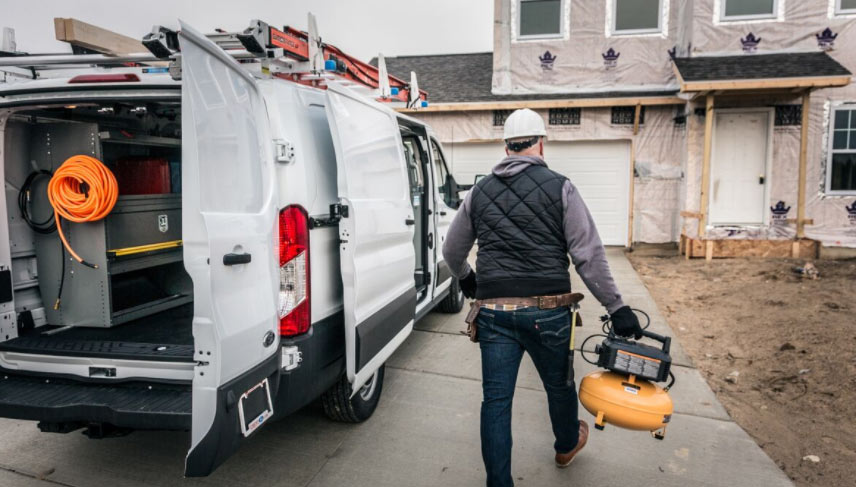 HVAC service van and technician ready for dispatch